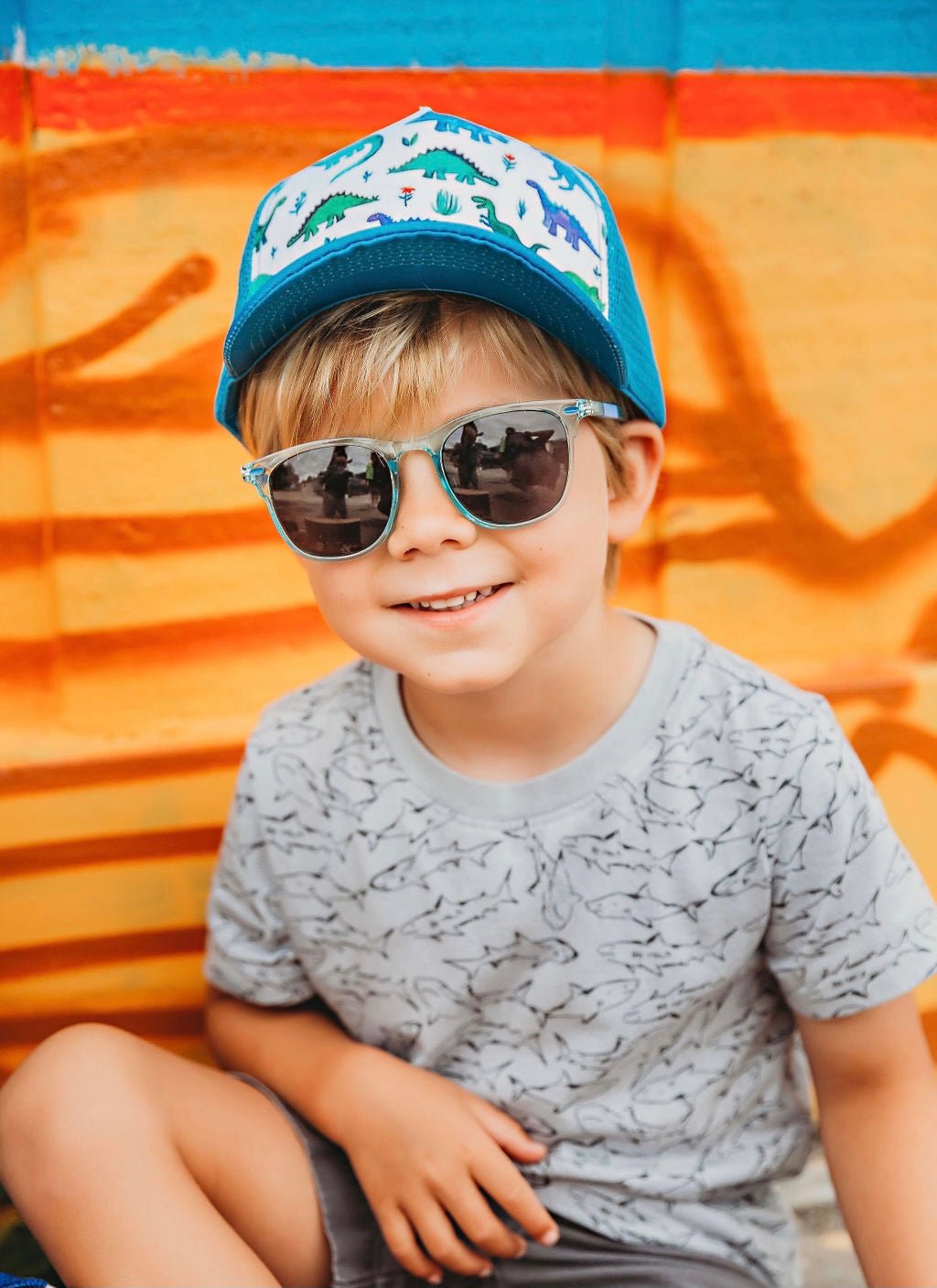 Blue Dinosaur Trucker Hat